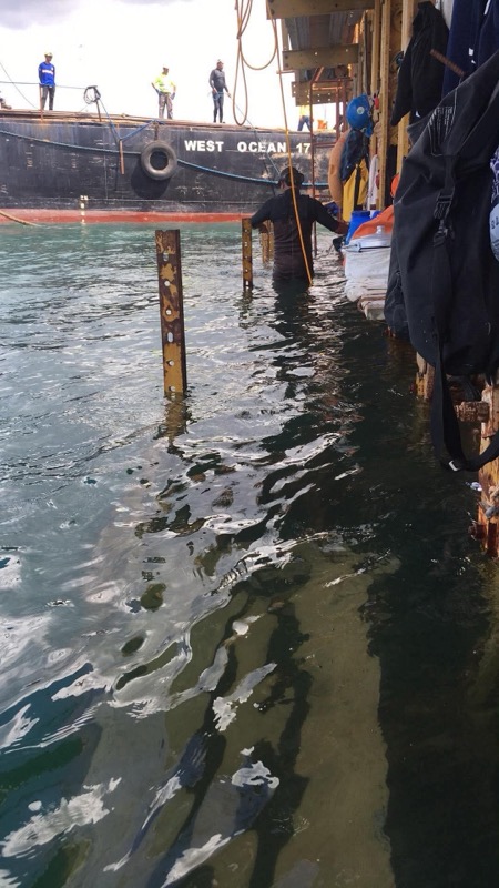 Vessel WEST OCEAN 17 with diver entering water